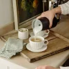 Dualit Drikke Og Brygning > Mælkeskummer m. Chokoladefunktion 340 ml, Sort